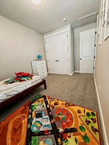 Wall-to-wall carpeting and neutral wall tones