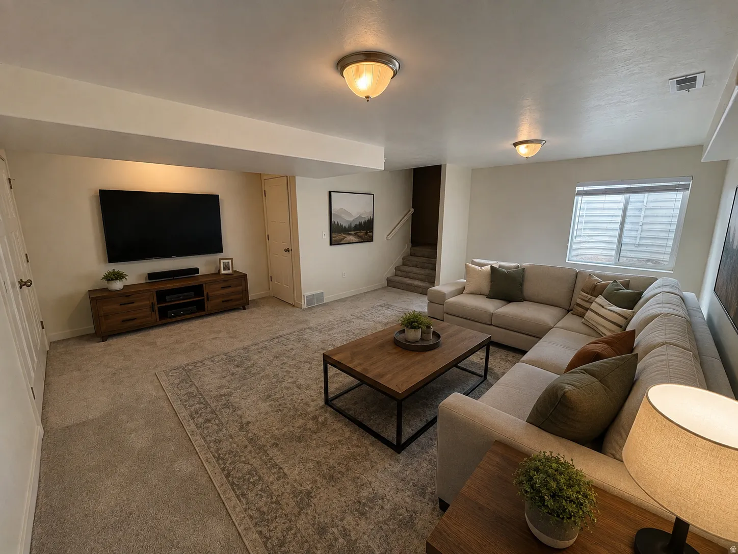 Downstairs living area. Could be 4th bedroom