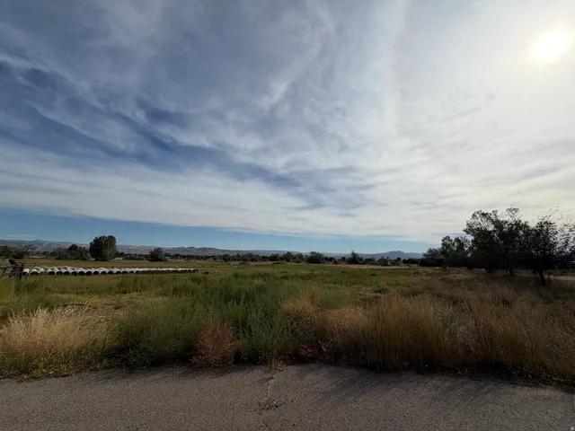Expansive natural landscape featuring varied vegetation