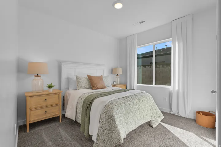 Carpeted flooring, a single window, recessed lighting, and white walls
