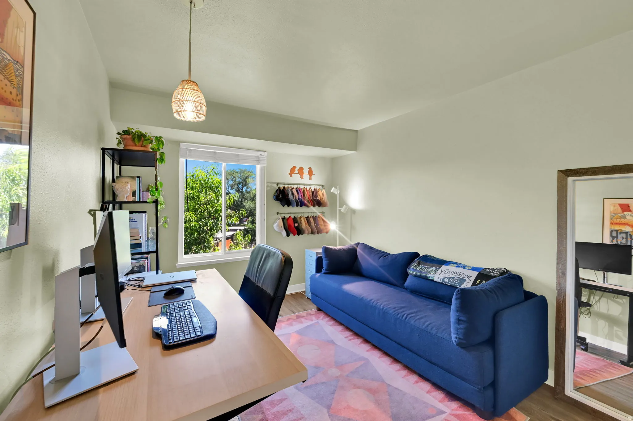 Recessed window, wood-finish flooring, and a contemporary ceiling light fixture