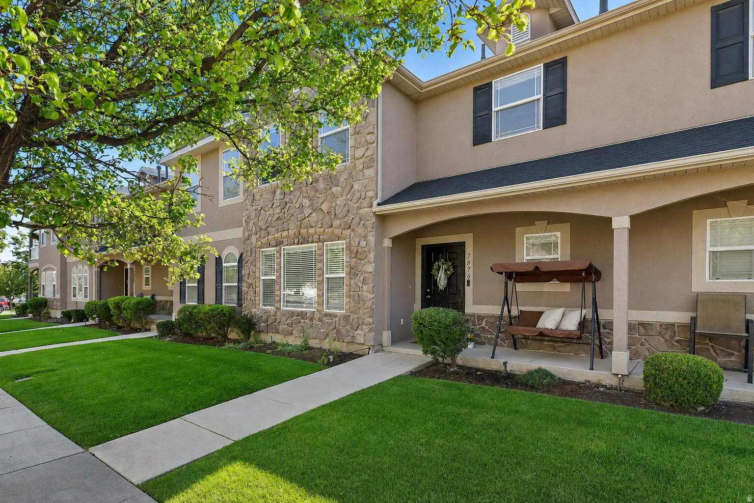 Stucco exterior with stone accent facade