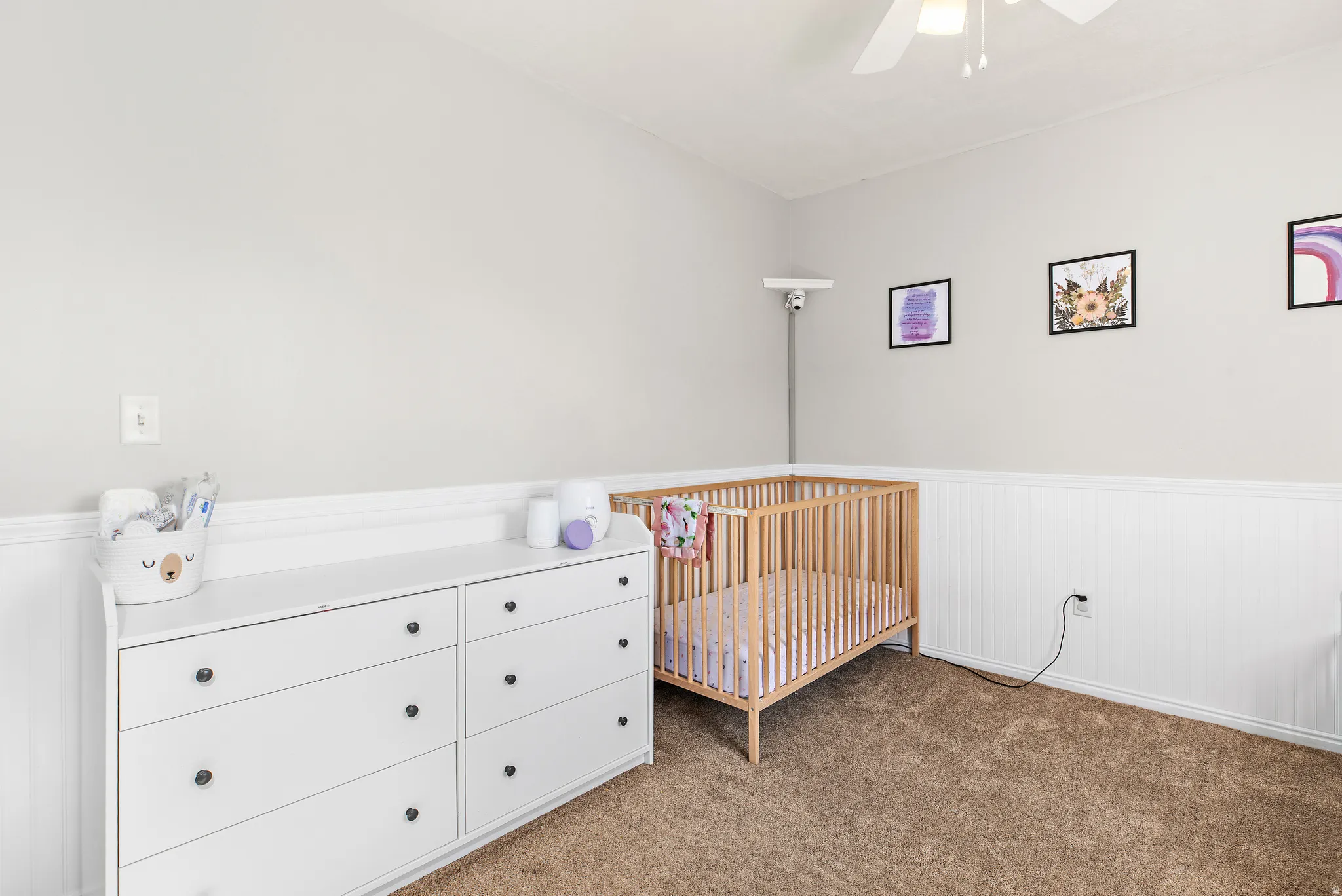 Sunny good size bedroom with custom trim work