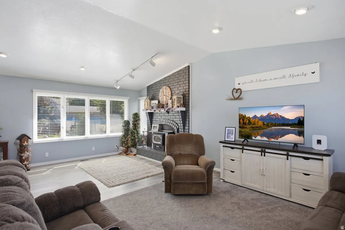 Vaulted ceiling with recessed lighting and track lighting