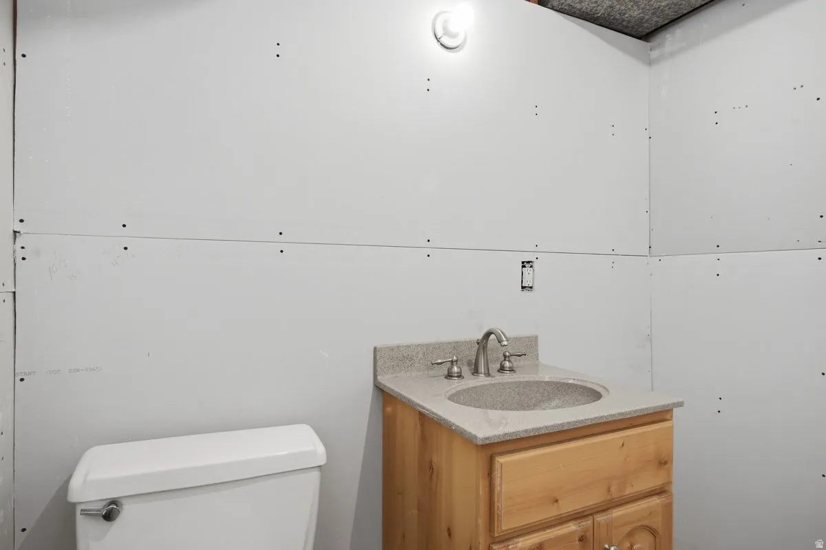 Usable toilet and sink. Bathroom is not finished. Add your own finishing touches. Paint, flooring and a shower.