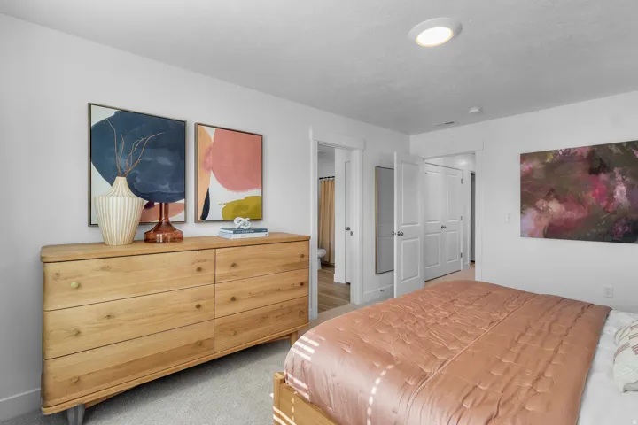 Recessed ceiling lighting, white interior doors, and light neutral wall finishes