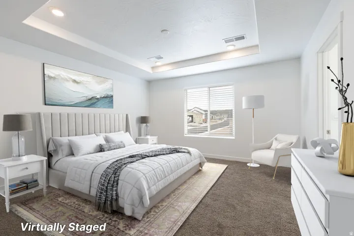 Tray ceiling with recessed lighting and crown molding