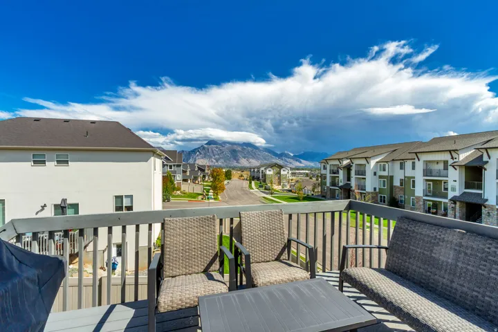 Upper-level deck with wood railing