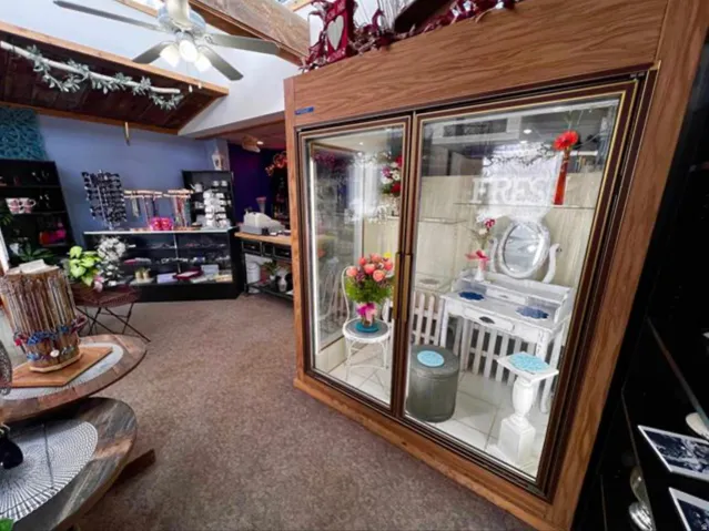 Wood-finish display case with glass doors