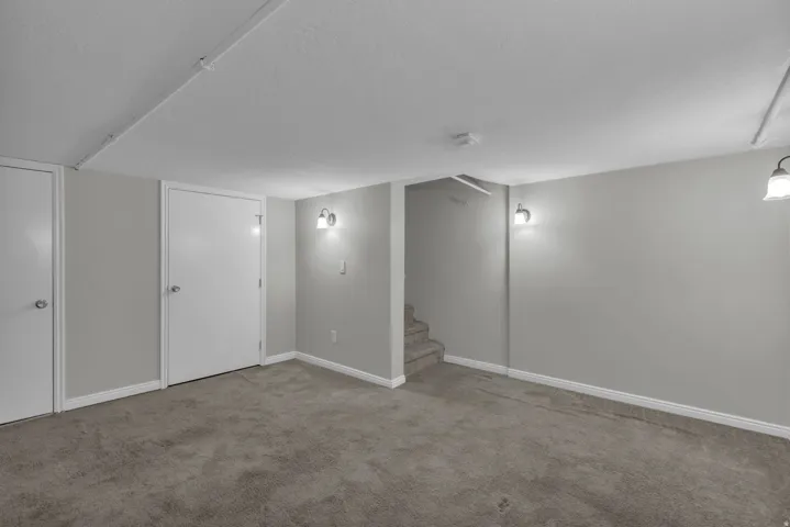Recessed lighting track and sconce lighting fixtures provide illumination