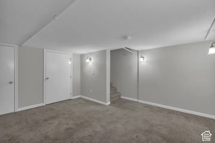 Recessed lighting track and sconce lighting fixtures provide illumination