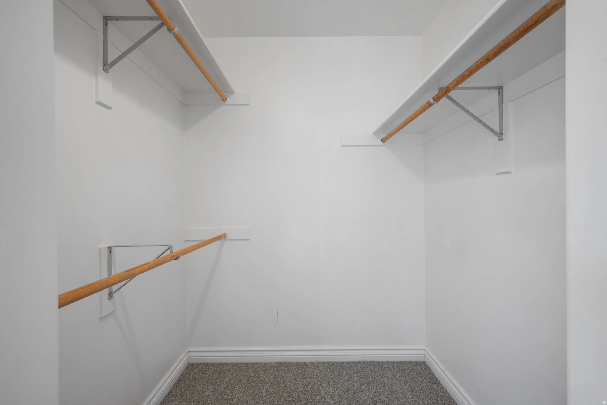 Built-in shelving with hanging rods