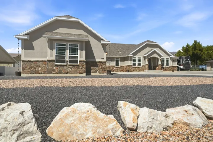 Stucco exterior with stone accent detailing