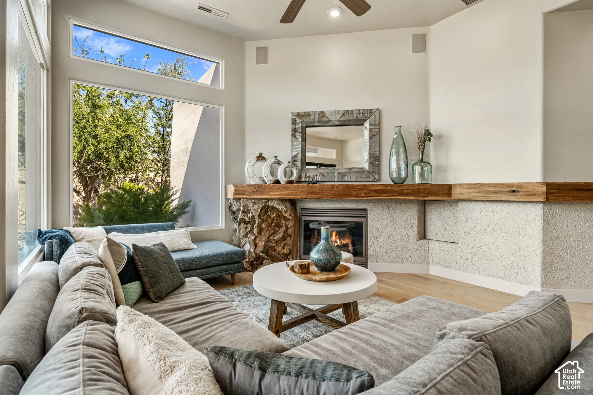 Corner fireplace with a substantial wood mantel