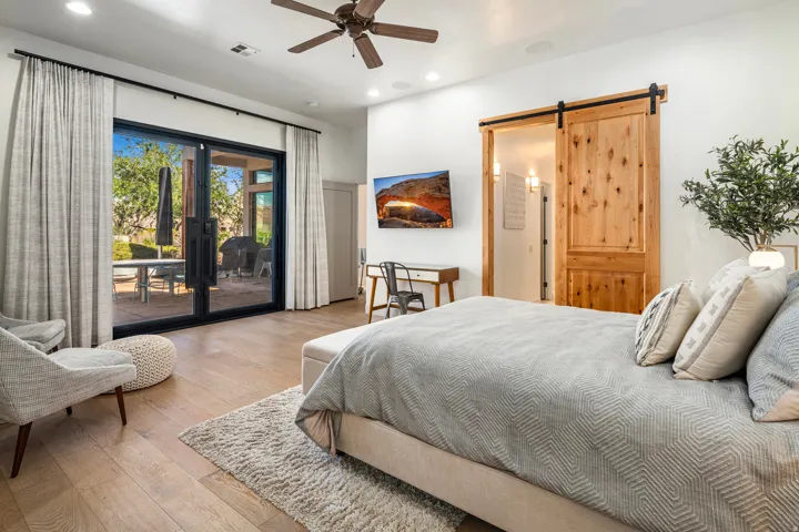 Wood-finish flooring, recessed lighting, and a ceiling fan