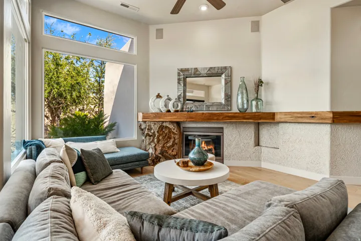 Corner fireplace with a substantial wood mantel