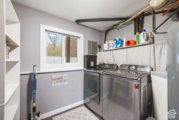 Built-in shelving, white window trim, and a white ledge with a fabric skirt