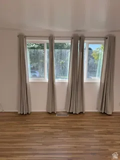 Wood-finish flooring with multiple windows