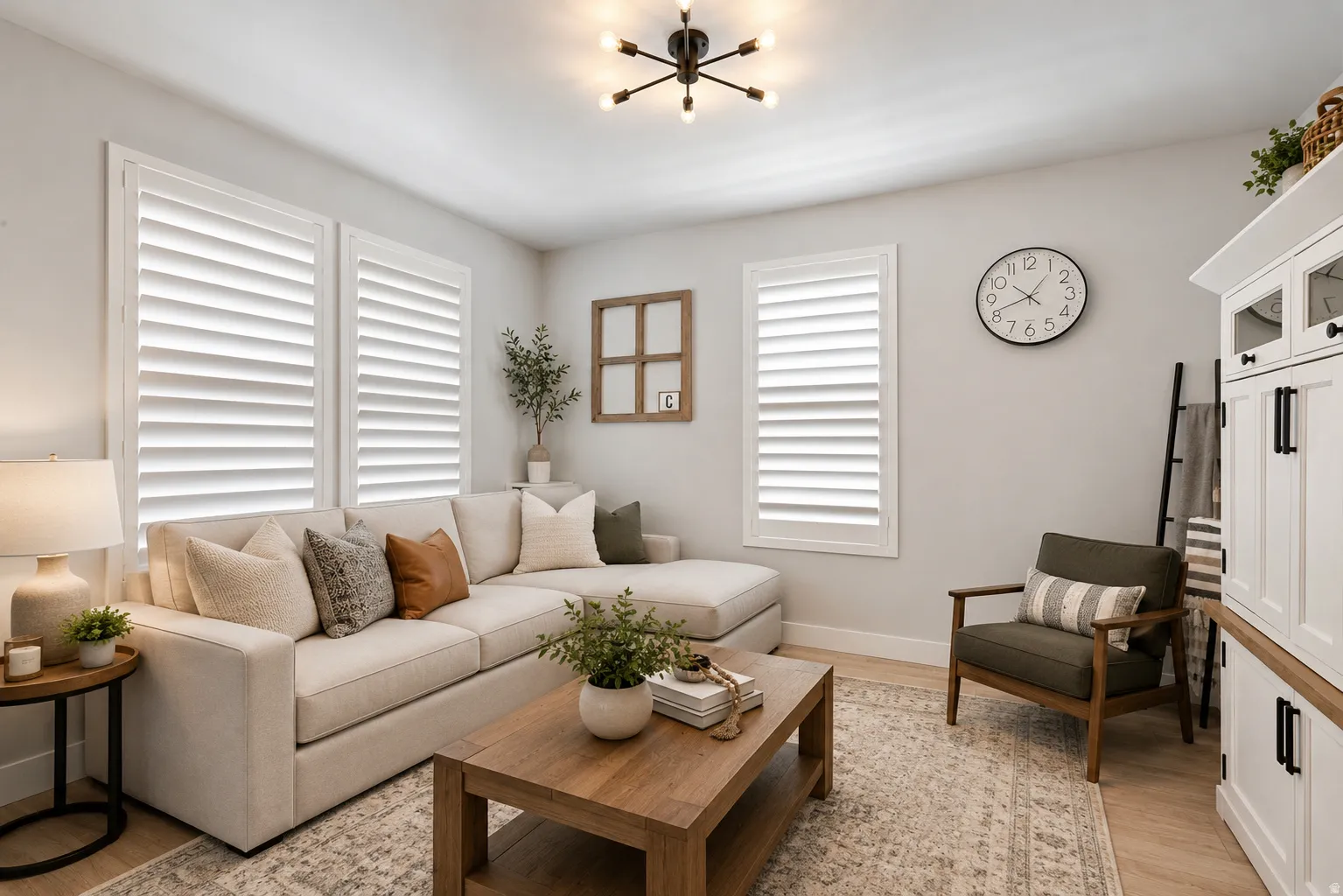 Light wood-finish flooring with white baseboards