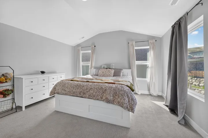 Vaulted ceiling accentuates the room's height