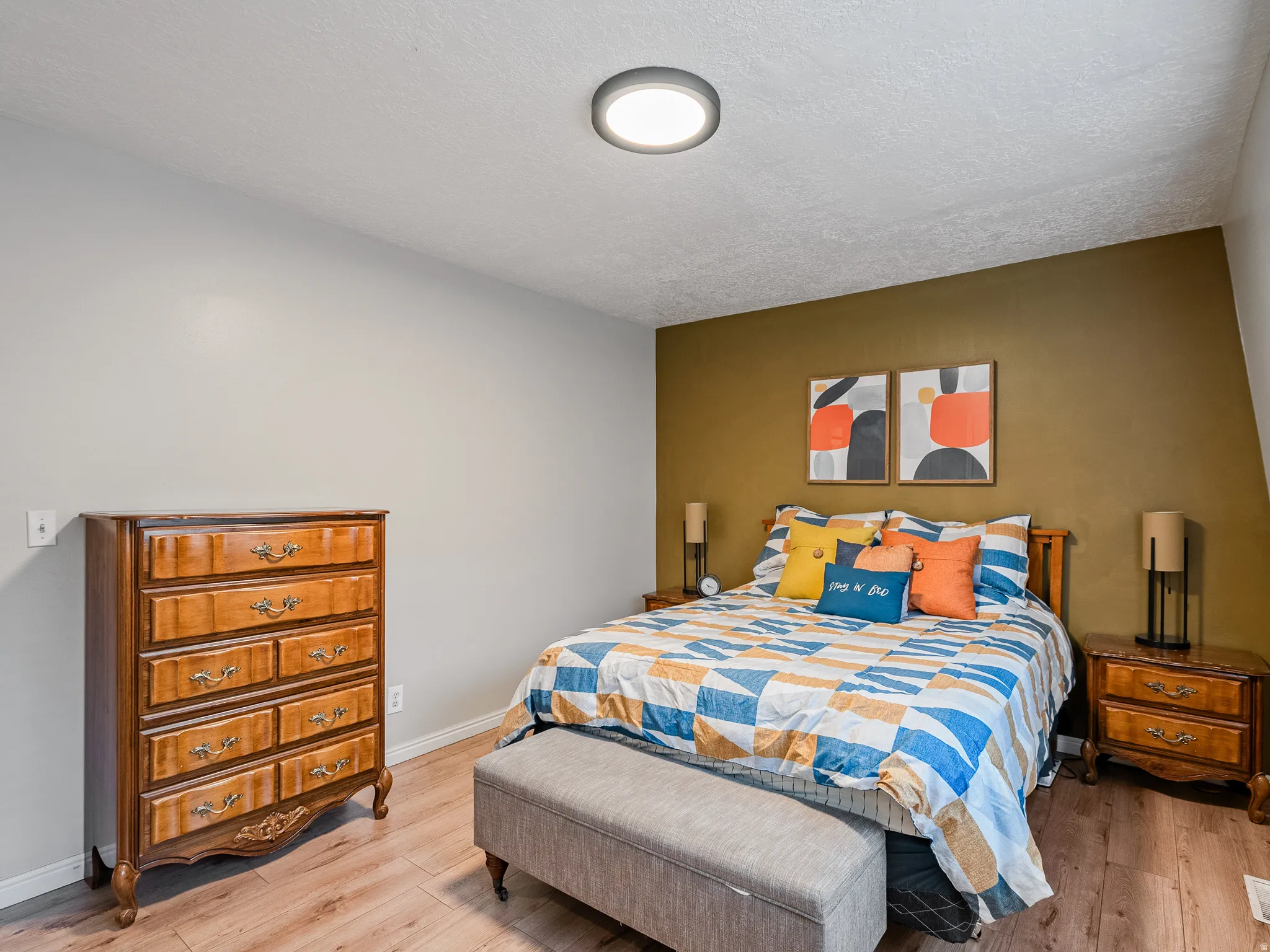 Wood-finish flooring with a neutral wall color palette