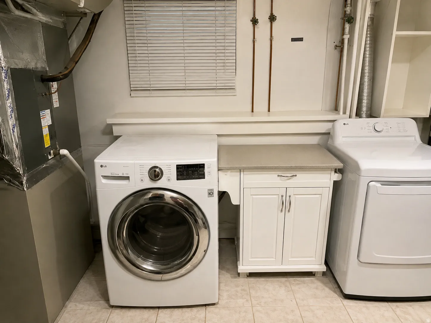 Shared laundry room space - Space has been cleaned up using AI