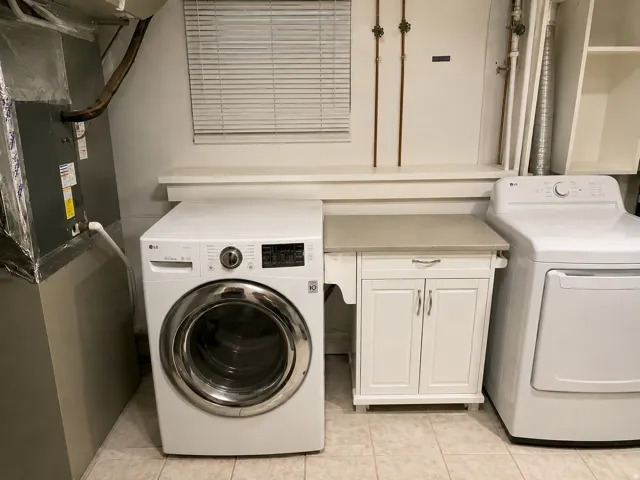 Shared laundry room space - Space has been cleaned up using AI
