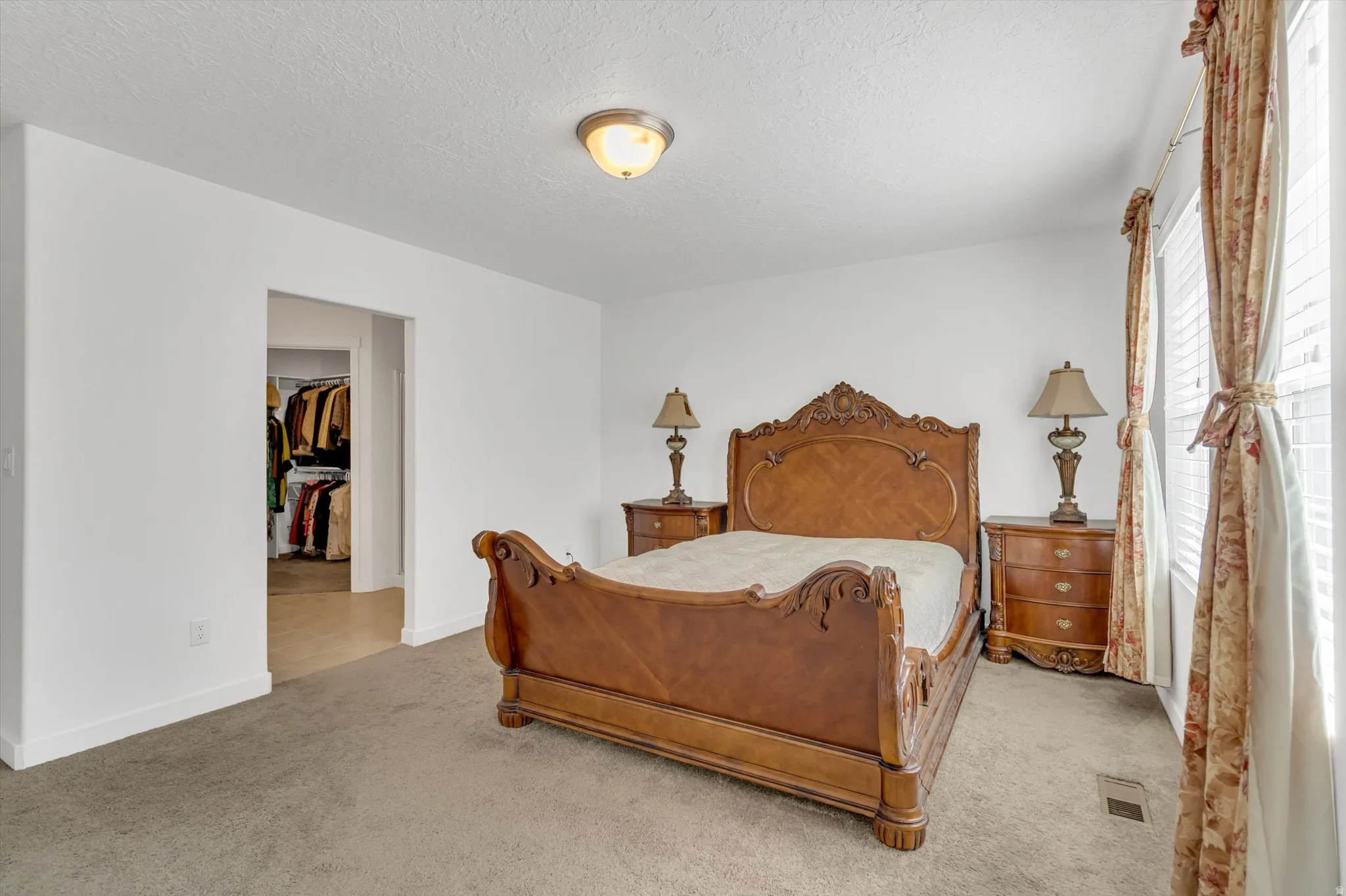 Recessed closet with wood-finish flooring