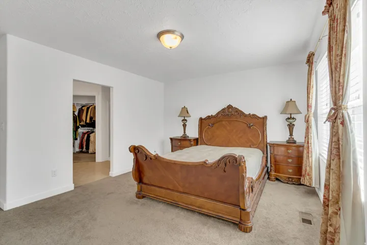 Recessed closet with wood-finish flooring
