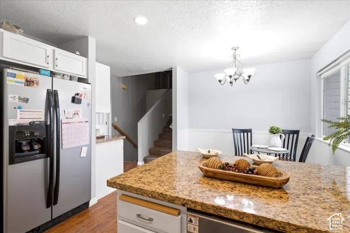 granite counter top and refrigerator