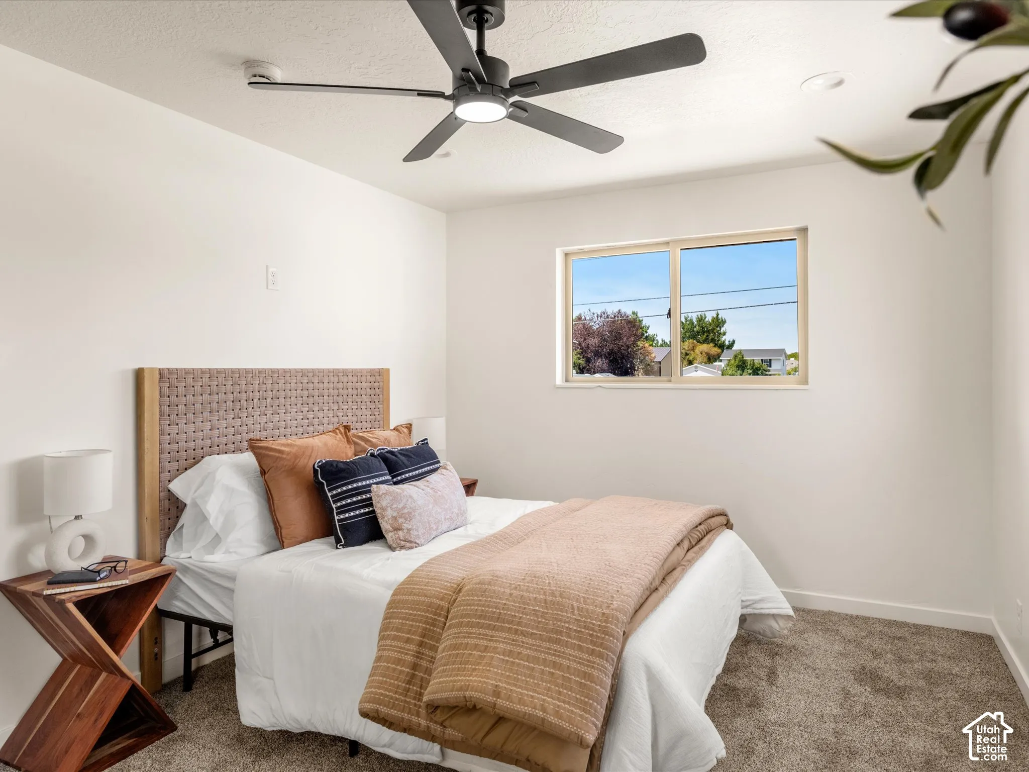 Primary Bedroom. Recessed lighting, ceiling fan, and window offering natural illumination