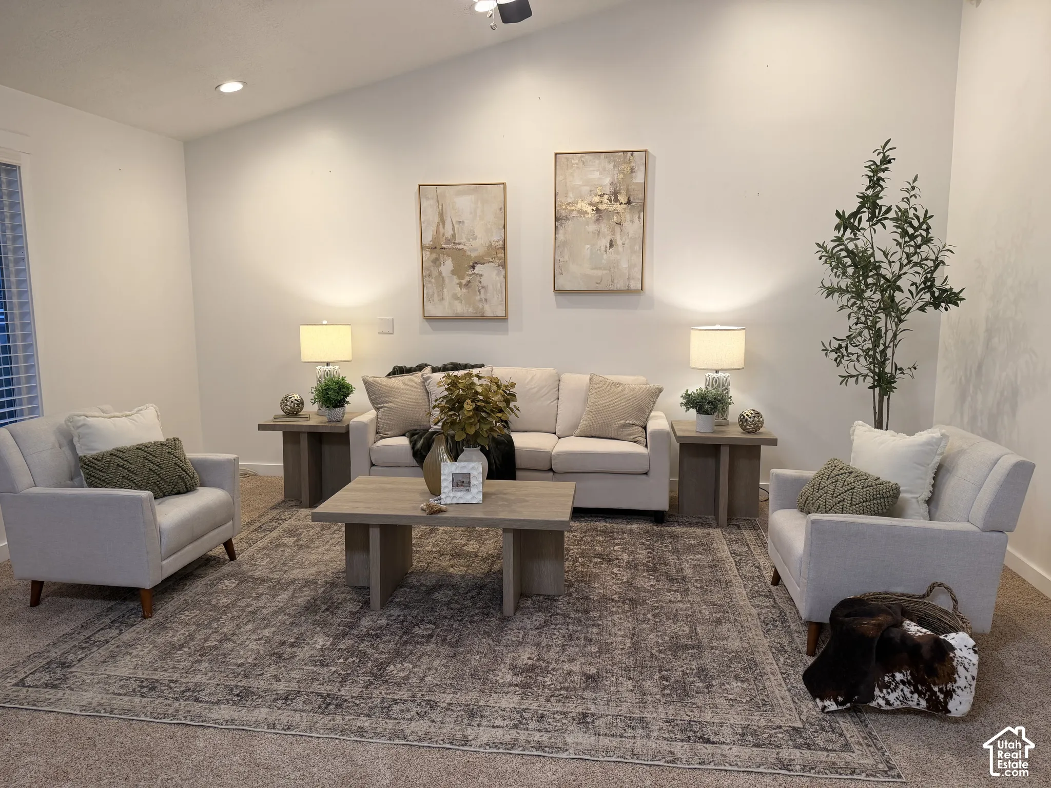 Vaulted ceiling featuring a ceiling fan and recessed lighting