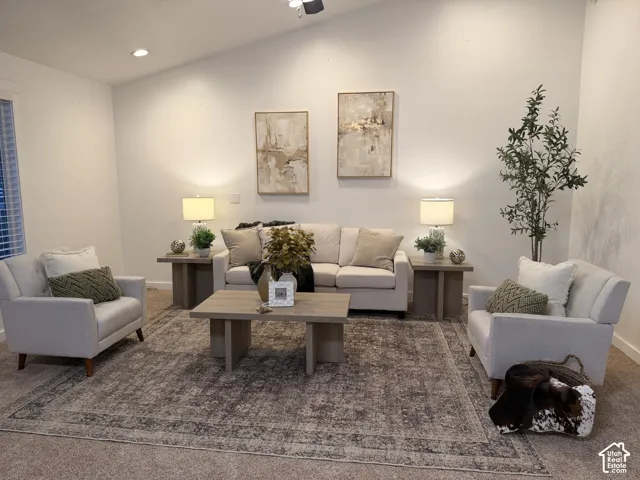 Vaulted ceiling featuring a ceiling fan and recessed lighting