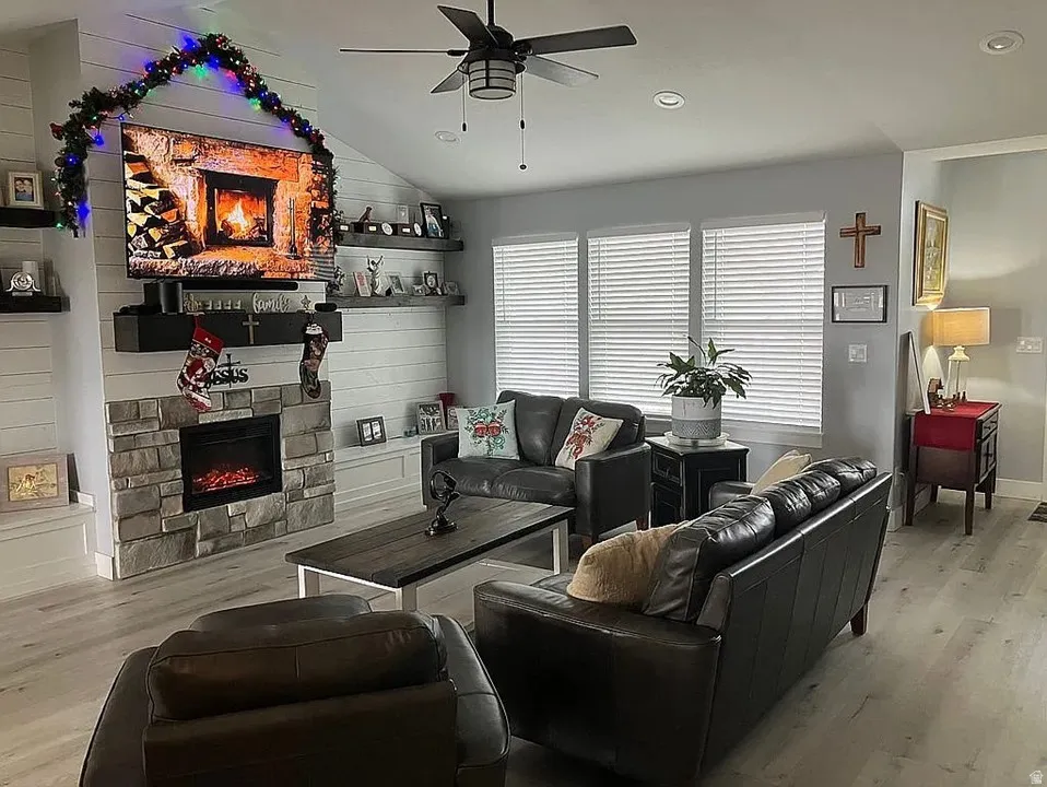 Cathedral ceiling with recessed lighting and ceiling fan