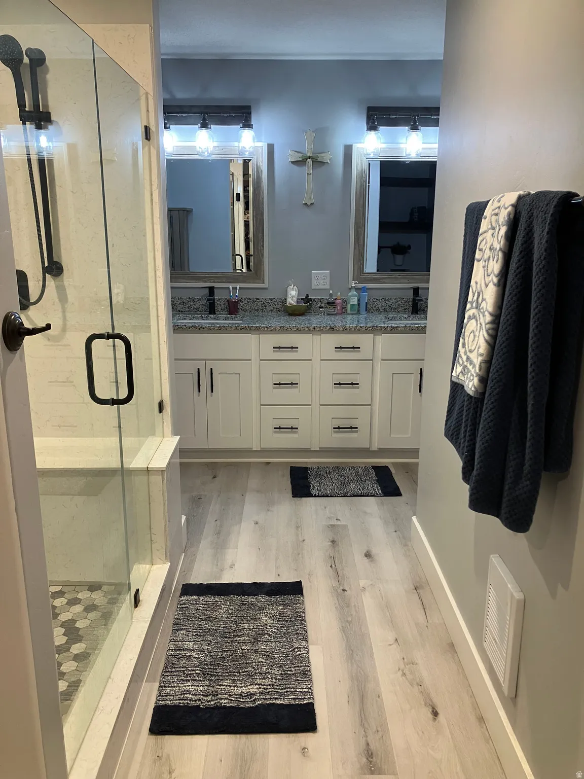 Dual vanity with stone countertops