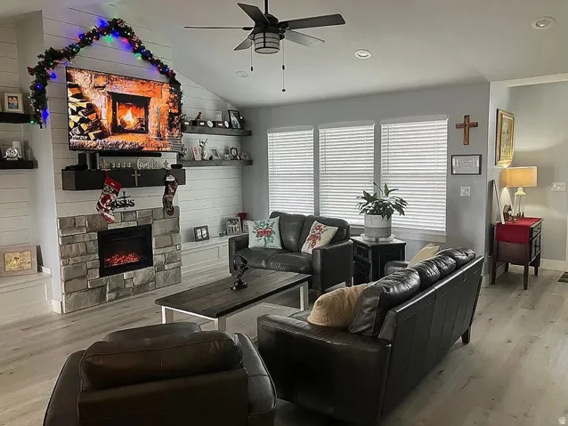 Cathedral ceiling with recessed lighting and ceiling fan