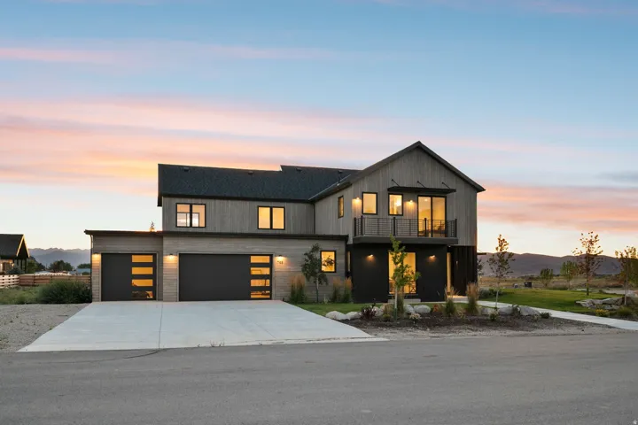 Modern farmhouse-style exterior with wood-finish siding