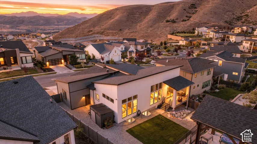 Modern architectural design with high-pitched rooflines and expansive windows
