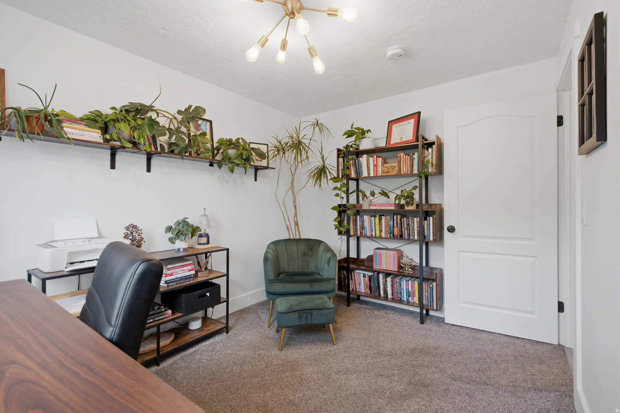 Recessed lighting, wood-finish shelving, and a modern light fixture