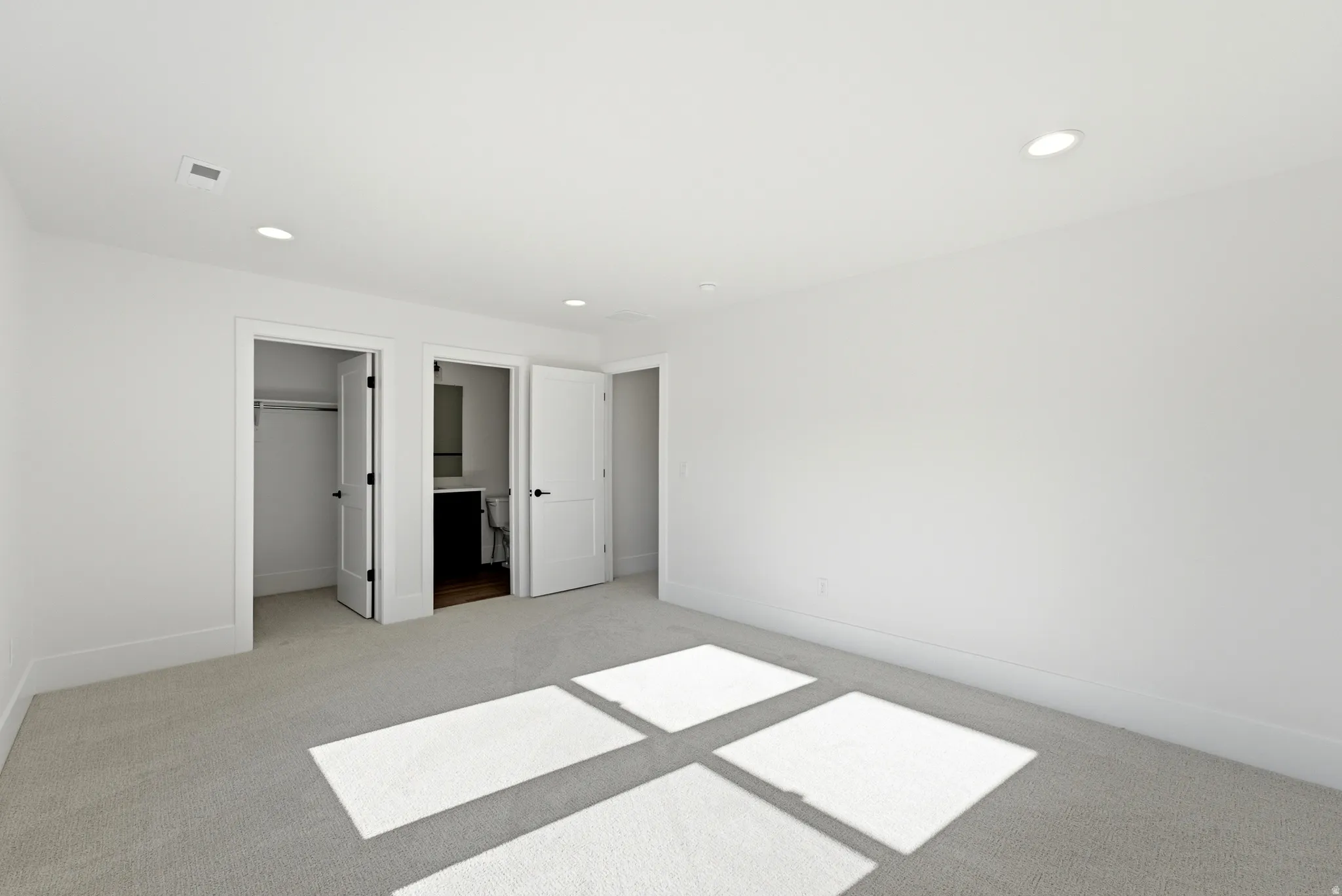 bedroom 1 of 3 with bathroom on upper level