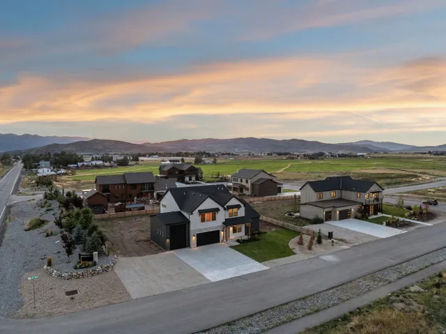 Expansive rural setting with mountain backdrop