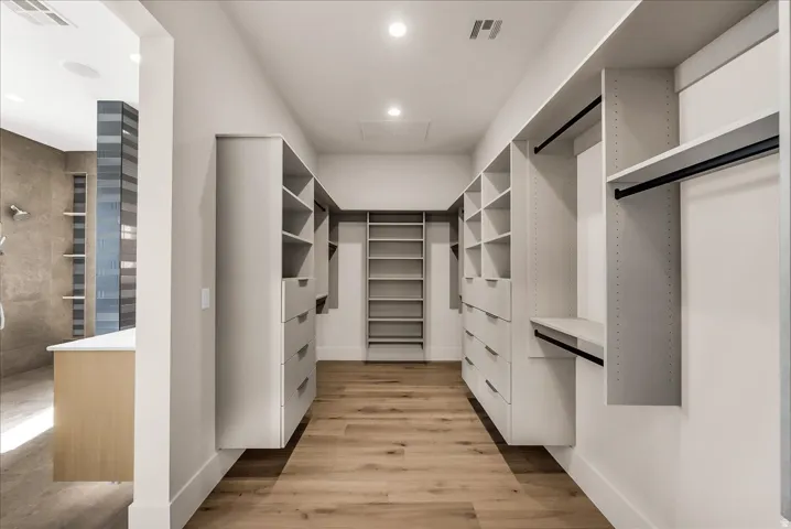 Custom built-in closet systems with shelving and hanging rods