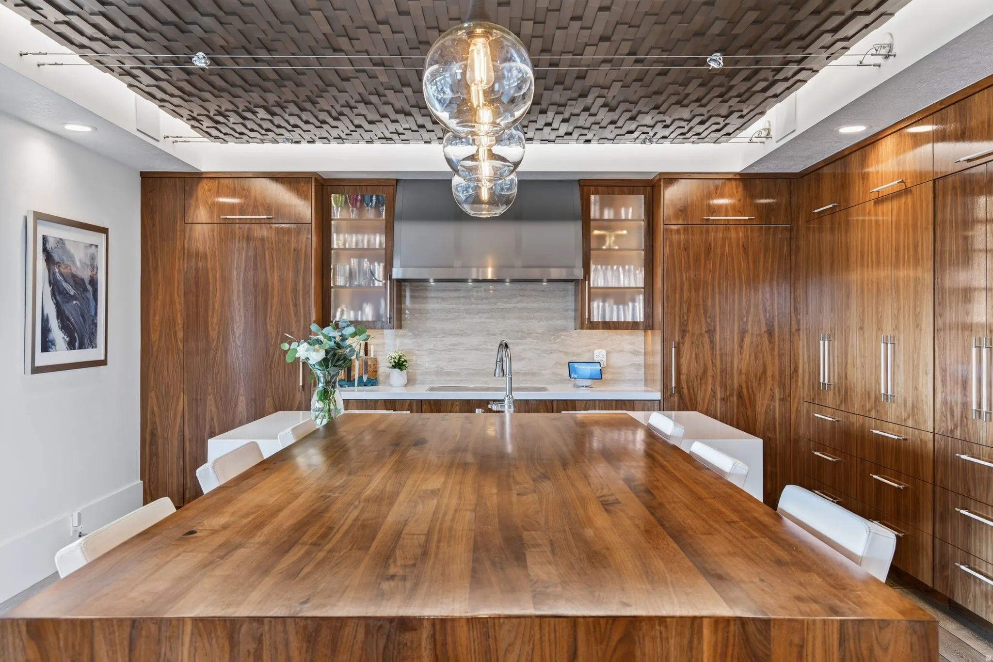 Hardwood island featuring a wood-finish countertop