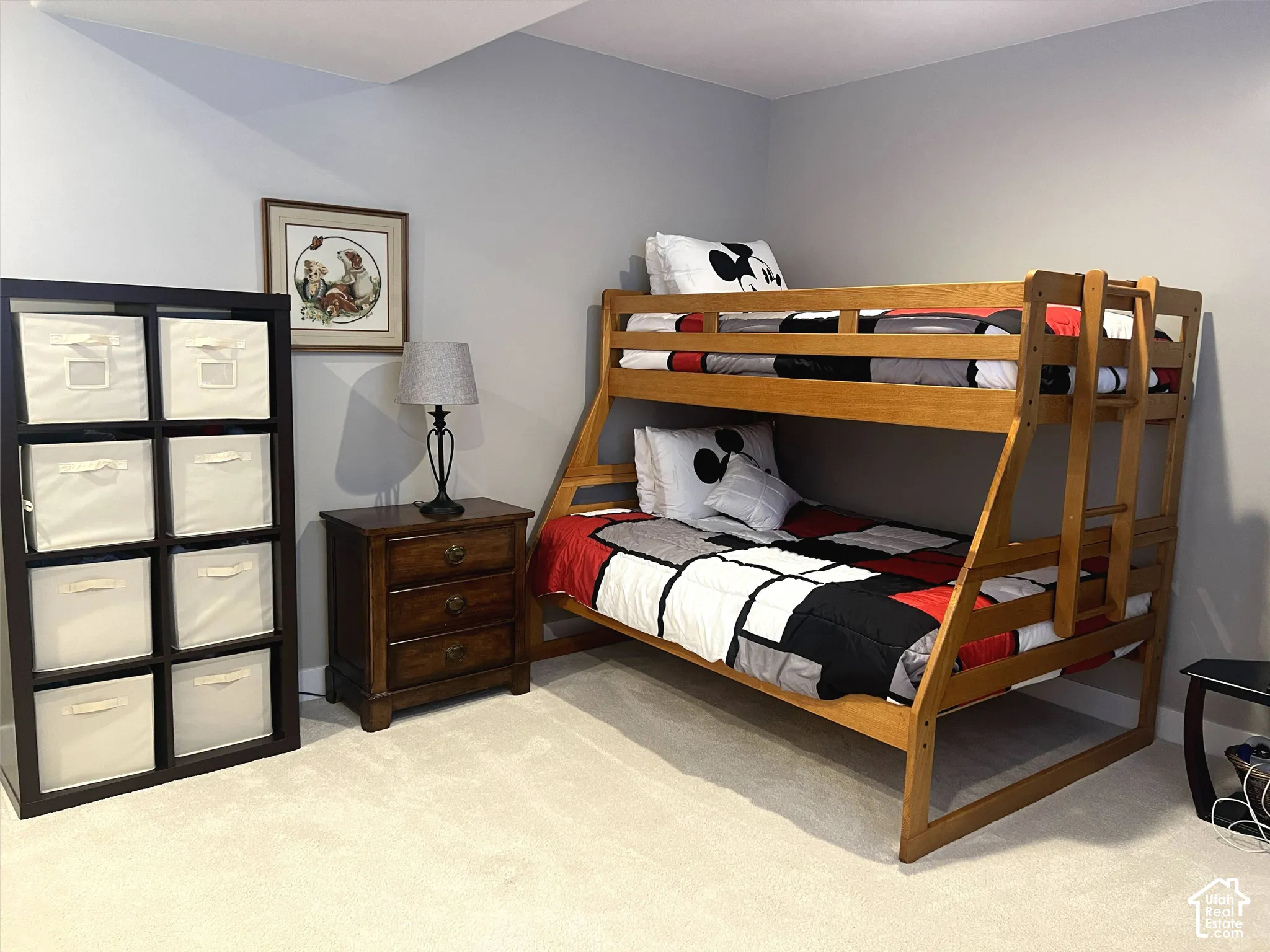 Wall-to-wall carpeting with light gray wall paint