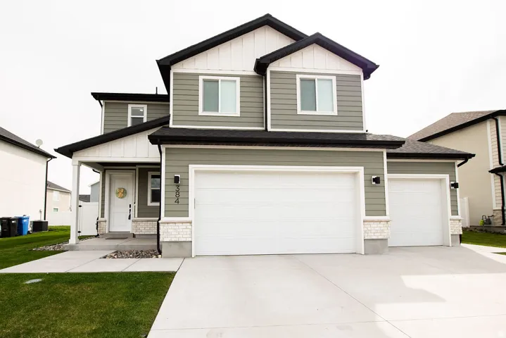 Contemporary two-story exterior with horizontal siding and contrasting trim