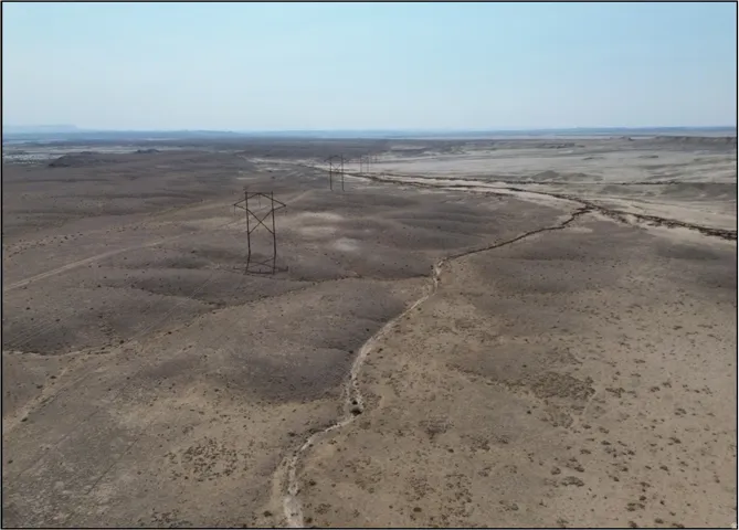 Expansive desert landscape with natural terrain variations