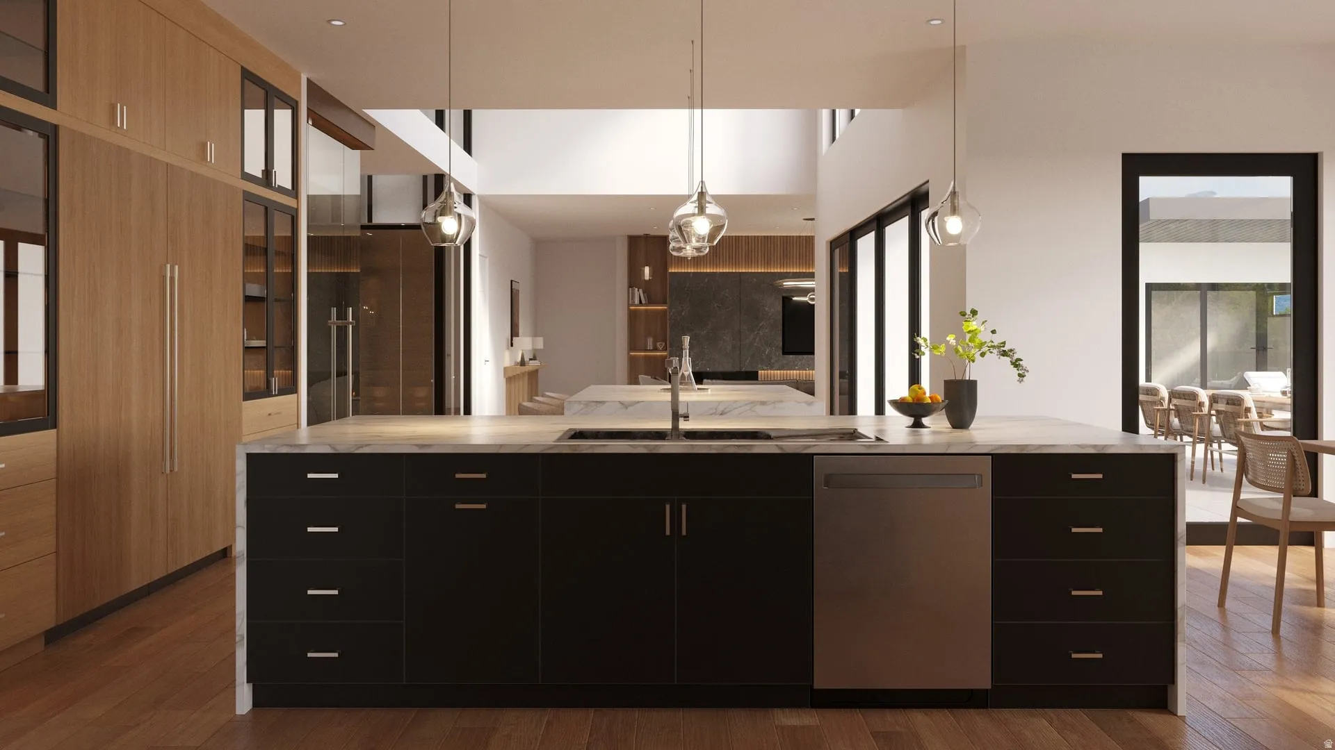 Expansive kitchen island with a light-toned countertop, stainless steel appliances, dark lower cabinetry, and contemporary pendant lighting