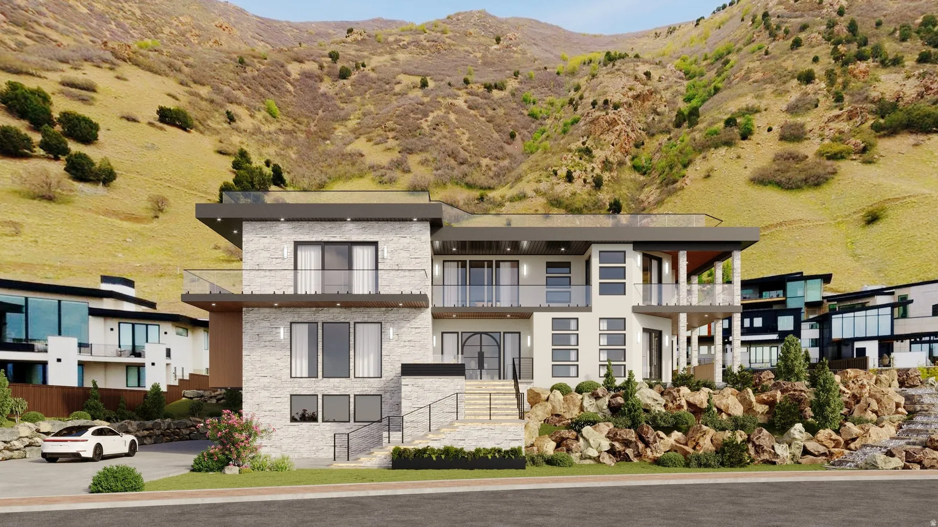 Contemporary exterior with multiple balconies and terraces, stone and stucco facade, expansive window banks, and a flat roofline