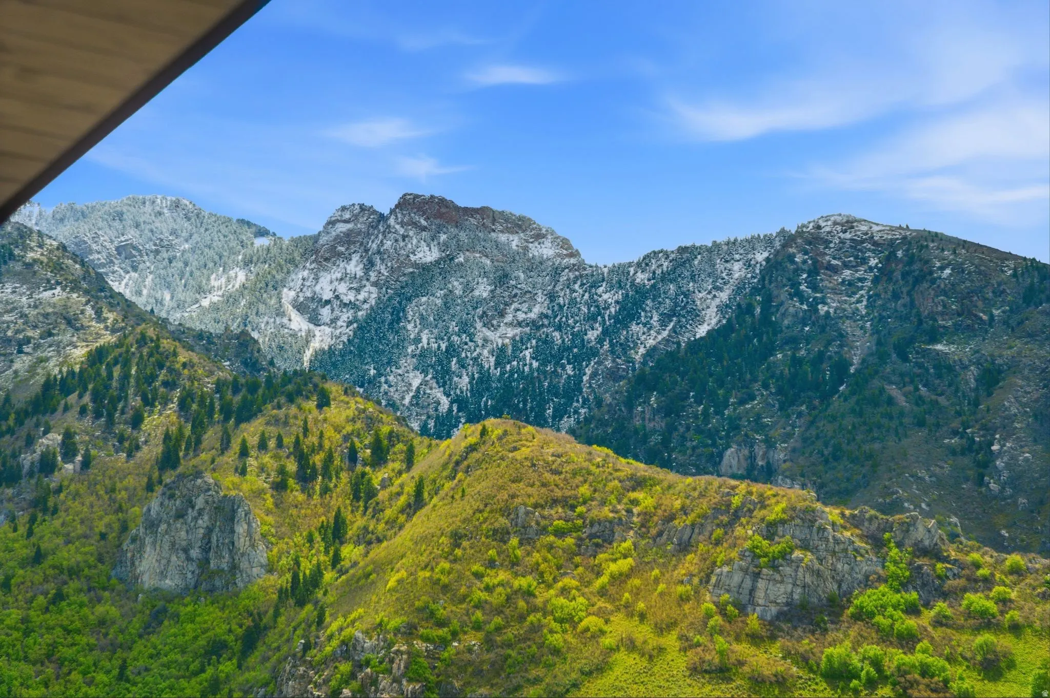 Mountain range with a blue sky background