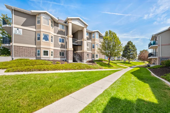 Exterior of condo building. Condo is located on main level.